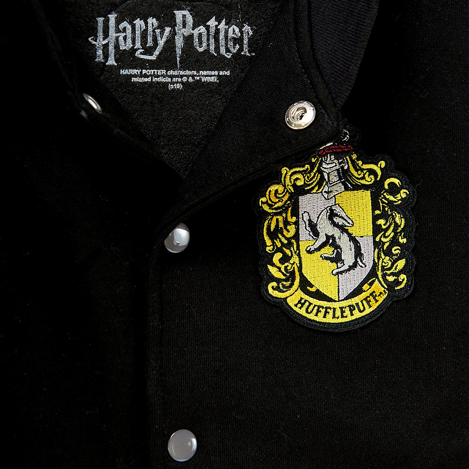 Produktbild Harry Potter - Hufflepuff Wappen College Jacke