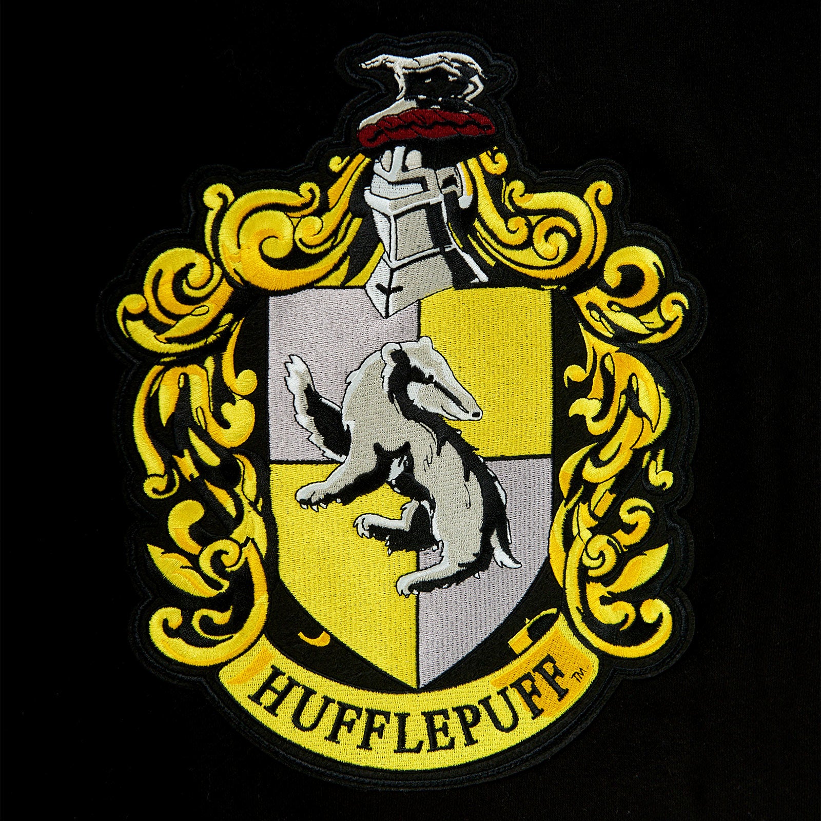 Produktbild Harry Potter - Hufflepuff Wappen College Jacke