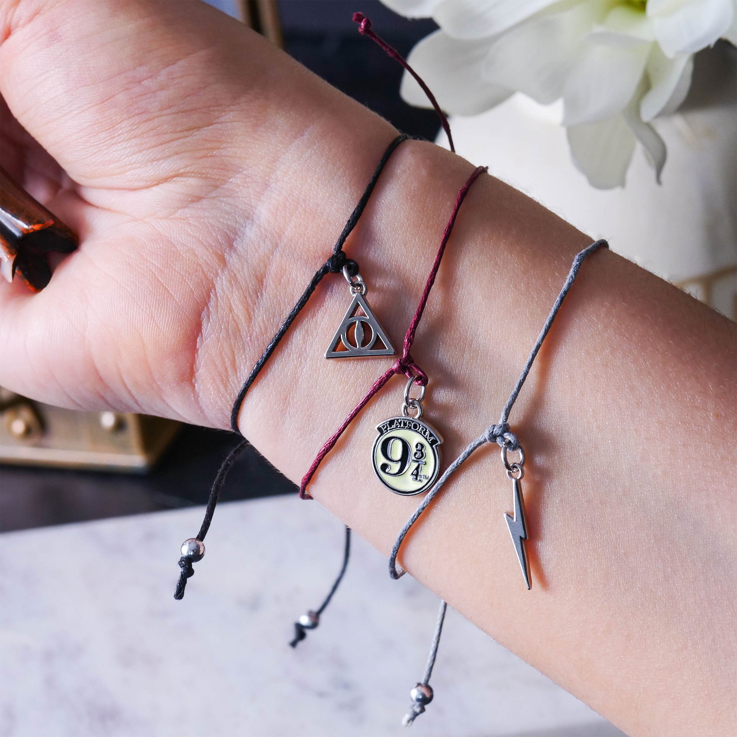 Produktbild Harry Potter - Armbänder mit Anhänger 3er Set