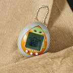 Produktbild Grogu Tamagotchi grau - Star Wars The Mandalorian