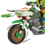 Produktbild Teenage Mutant Ninja Turtles: Mutant Mayhem Drive N Kick Action Figur Leonardo & Motorrad 11 cm